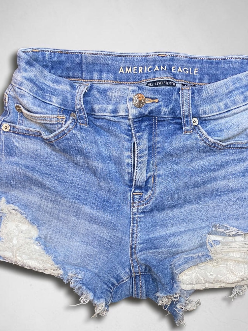 American Eagle Distressed Denim Shorts with White Lace Patchwork Details sz4